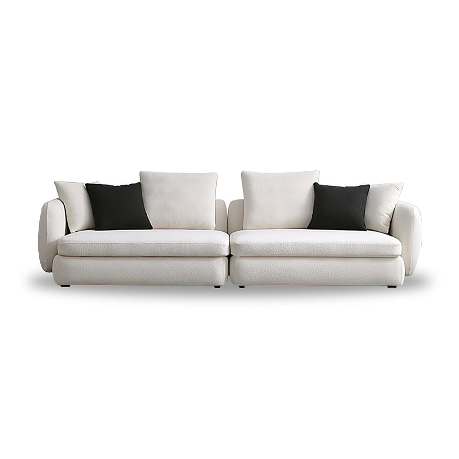 Velvet sofa angled view with solid wood frame