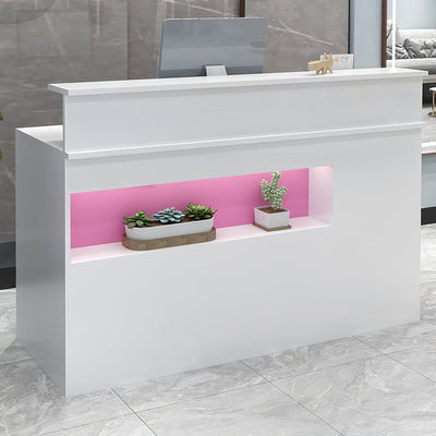Small cashier counter angled front view with a pink display niche