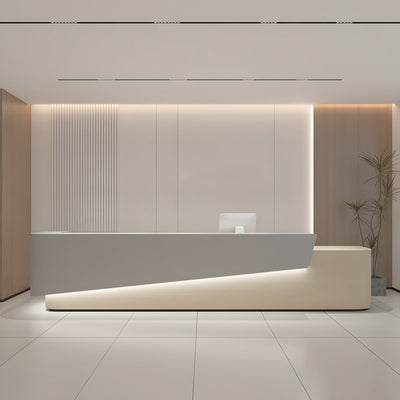 Contrast colour reception desk front view with two-tone angular panels and base lighting