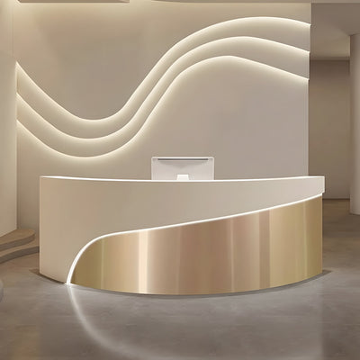 Curved beauty salon reception desk front view with beige and gold curved panels and illuminated trim