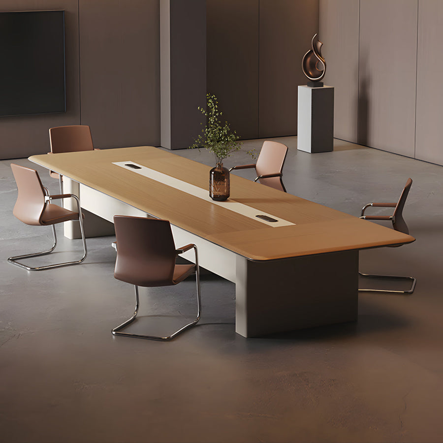 Rectangular conference table with rounded corners in a meeting room