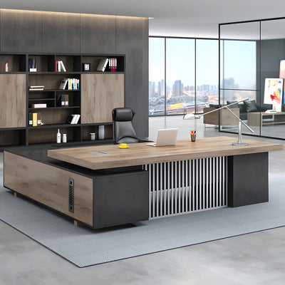 Industrial L-shaped executive desk with Cable Box and Side Storage in mid-tone finish, shown in an executive office