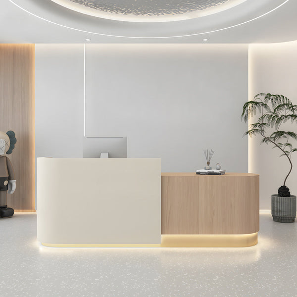 Curved reception desk front view with cream and timber curved corner panels and base lighting